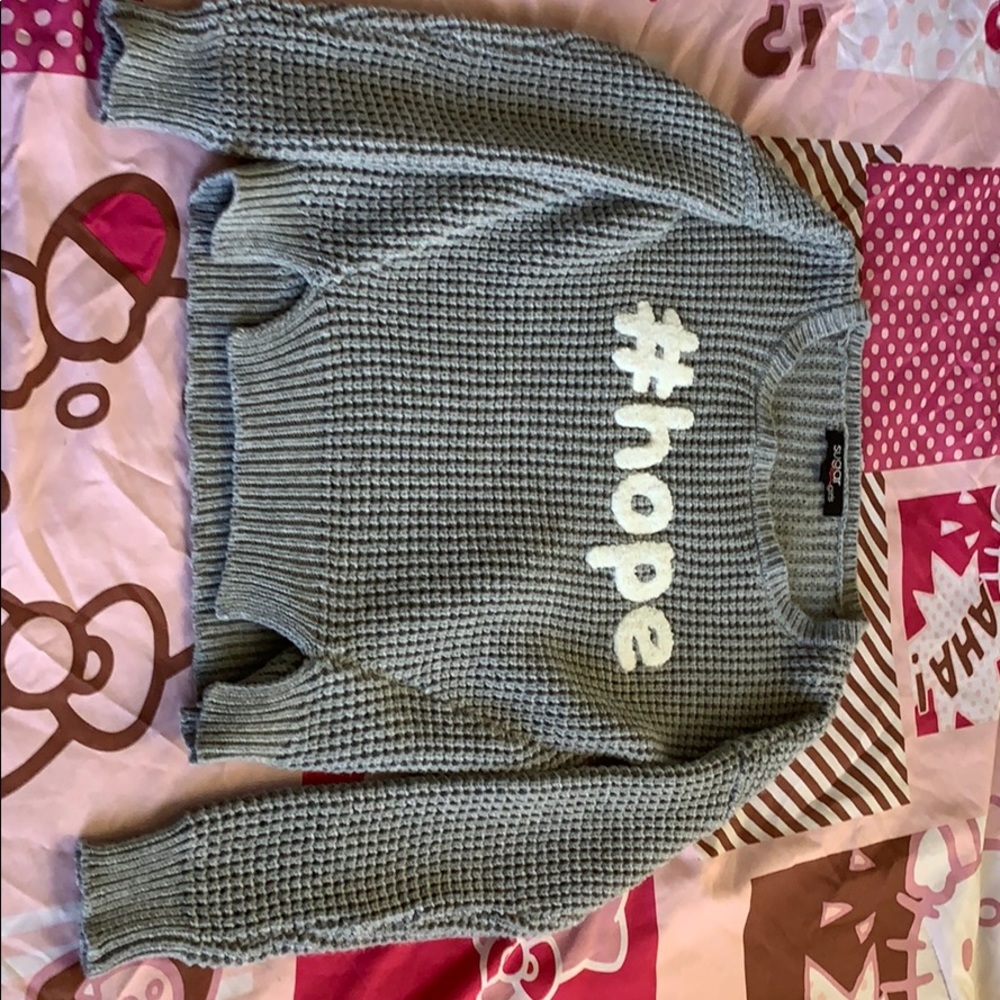 I am selling a gray gray yarn hoodie
